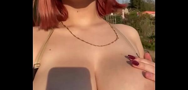  18 YEAR OLD WOMAN SHOWS TITS OUTDOORS